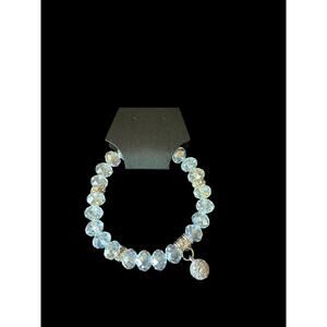 Clear beads with faux silver accent stretchy bracelet